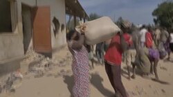CLEAN : Looters ransack government food warehouse in central Nigeria News Clip