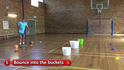 Station: Bouncing › Bounce the ball in the buckets | Teaching fundamentals of PE (K-3) Instructional Video