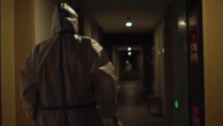 CLEAN : Beijing 2022: Hazmat suits in the dark - Olympics staff work at night News Clip
