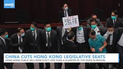 China Cuts Legislative Seats In Hong Kong News Clip