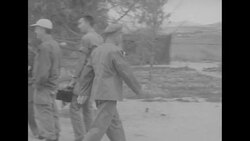 During Korean War, Chinese Communist, North Korean, and UN negotiators at first anniversary of peace talks in Panmunjom, North Korea News Clip