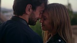 Happy couple on vacations. Old town panorama in background Stock Footage