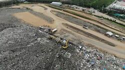 Large garbage pile, degraded garbage. Pile of stink and toxic residue / Garbage pile in trash dump or landfill - Recycling industry. Bird's-eye view from drone Stock Footage