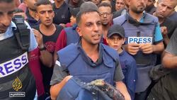 Al Jazeera's journalist al-Ghoul & cameraman al-Rifi killed in Israeli attack on Gaza laid to rest Instructional Video