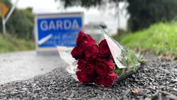 Floral tributes and garda cordons near Tallanstown after three found dead at property on Monday News Clip