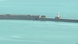 Rescued migrants being taken ashore in Dover News Clip