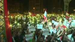 CLEAN : Lebanese take to streets for 10th day defying Hezbollah News Clip