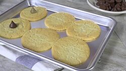 Decorating cookies with chocolate candy Stock Footage