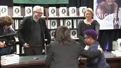 Michelle Obama signs books in New York Instructional Video