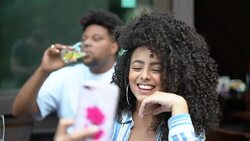 Happy young couple taking a selfie in a bar Stock Footage