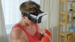 Boxer Training in Virtual Reality Goggles Stock Footage