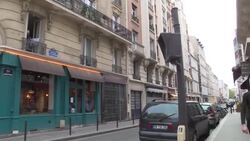 CLEAN : Man plays clarinet from his window in Paris following public applause for healthcare workers News Clip