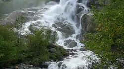 View waterfall scenes in mountains, national park Dombai, Caucasus, Russia Stock Footage