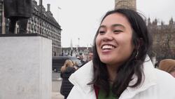 People outside the House of Parliament react to news about the Prime Minister Rishi Sunak's new controversial migrant plan News Clip