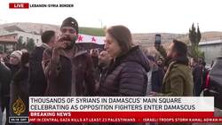 Overjoyed Syrian opposition supporters interrupt Al Jazeera live report News Clip