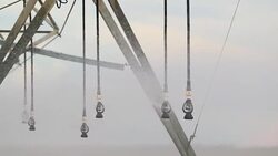 Pivot sprinkler system irrigating crops. Irrigation pivot system watering agriculture field in 4K 60fps Stock Footage