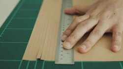 Woman artist is cutting paper Stock Footage