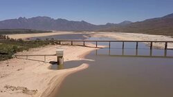 Aerial of empty dam Stock Footage