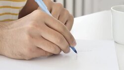 Close Up of Writing Hands at Work, Business Plan Stock Footage