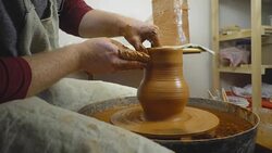 Potter makes a jug Stock Footage