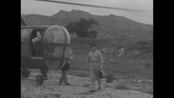 During Korean War, two US officers, members of UN negotiating team, arrive in Kaesong, North Korea, for peace talks News Clip