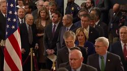 People pay tribute at coffin of late US President Bush in Washington Instructional Video