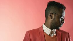 Stylish Man Posing against Pink Background Stock Footage