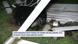 Caught on camera: Car crashes into a fence of East Islip home and drives away News Clip