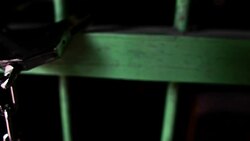 Slow Motion: Shackle hook stuck in the dark jail Stock Footage
