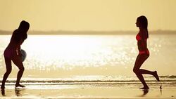 Luxury destination multi ethnic female on tropical beach Stock Footage