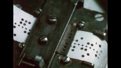 UNITED STATES 1960s: Close up, line of type in machine. Stock Footage