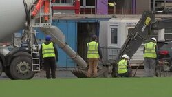 Concrete being laid at the New Plough Lane Stadium construction site News Clip