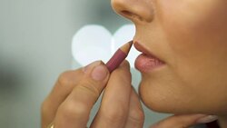 Beautiful young girl in a beauty salon Stock Footage