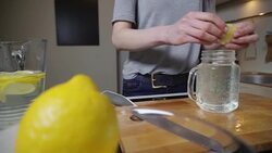 Young woman pouring lemonade Stock Footage