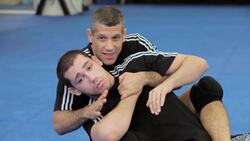 How to Do a Rolling Arm Bar from Back Mount MMA Submission Instructional Video