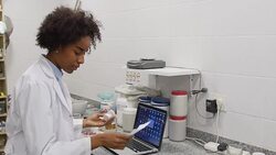 Chemist analyzing pills while reading prescription Stock Footage
