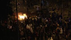 Protesters in Barcelona set fire to barricade Instructional Video