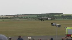 Douglas Dakota aircrafts take off from Imperial War Museum Duxford News Clip