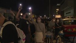 CLEAN : Crowds gather outside Hong Kong paper Apple Daily's headquarters to show support News Clip