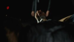 Human trafficking, criminal receiving money for kidnapped girl in car trunk Stock Footage