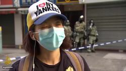 Hong Kong protesters hunker down as police cordon off campus News Clip