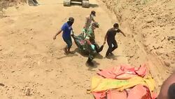 CLEAN : Mass burial held in Palu for quake and tsunami victims News Clip