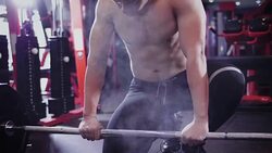 Young muscular man doing heavy dead-lift exercise at gym, lifestyle sport and bodybuilding concept Stock Footage