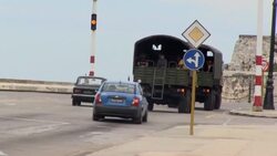 CLEAN : Cubans stroll around Havana as police is deployed amid opposition call to defy protest ban News Clip