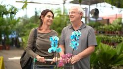 Portrait of Mature Couple Customer at Flower Market Stock Footage