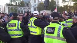 Violent scuffles between police and counter-demonstrators in Parliament Square on Armistice Day News Clip
