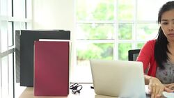 Asian woman busy of working with document at office Stock Footage