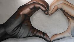 Street artist creates anti-racism mural in Peterborough News Clip