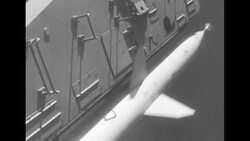 USS Boston, the world's first guided missile cruiser, on maneuvers in March of 1956 News Clip