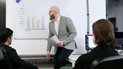 Man presenting data in chart Stock Footage